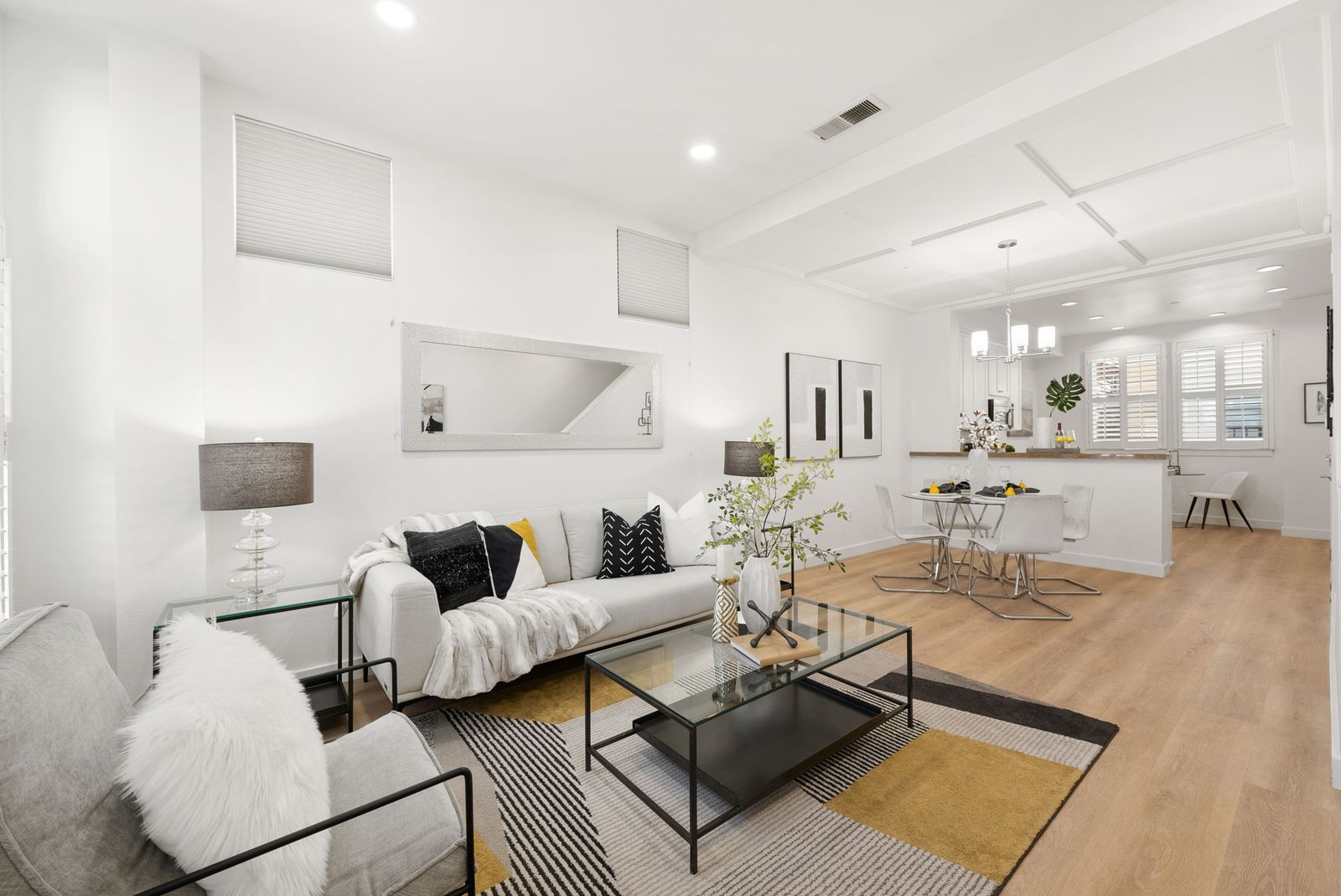 Great room with kitchen beyond